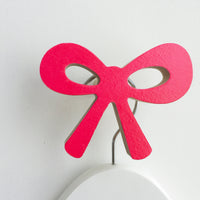 knobbly. ribbon bow wall hook hot pink