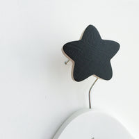 knobbly. star wall hook black