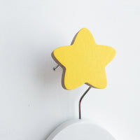 knobbly. star wall hook yellow