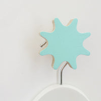 knobbly. sunburst wall hook minty blue green